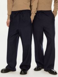 AMI Paris Spodnie dresowe UTR212.WV0018 Granatowy Regular Fit. Niebieskie spodnie sportowe męskie AMI PARIS, m, bez wzorów, z dresówki. Za 1,049.00 zł.