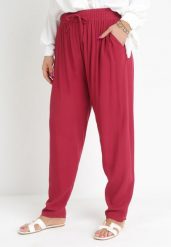 Bordowe Spodnie z Gumką w Pasie i Wsuwanymi Kieszeniami Adantha. Czerwone spodnie materiałowe damskie Born2be, bez wzorów, z jeansu, eleganckie, plus size. Za 34.99 zł.