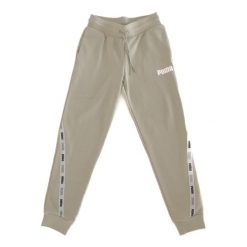 Puma Spodnie Tape 67402112. Zielone spodnie dresowe damskie Puma, bez wzorów, sportowe, długie. Za 140.99 zł.
