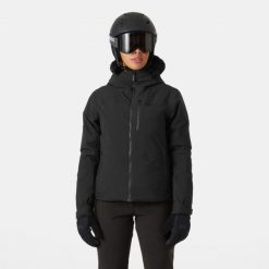 Damska kurtka narciarska Helly Hansen Valdisere 2.0. Czarne kurtki sportowe damskie Helly Hansen, na zimę, bez wzorów, bez ramiączek, bez kaptura, narciarskie. W wyprzedaży za 1,243.50 zł.