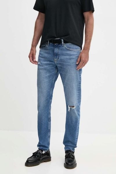 CALVIN KLEIN Błękitne męskie jeansy Slim Taper, Rozmiar 30/32. Niebieskie jeansy męskie Calvin Klein, z bawełny, eleganckie. W wyprzedaży za 323.99 zł.