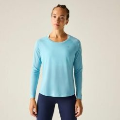 Damska koszulka z długim rękawem do biegania Nimble. Niebieskie bluzki damskie Dare 2B, bez wzorów, z lyocellu, sportowe, bez kołnierzyka, bez ramiączek. Za 159.99 zł.