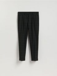 Garniturowe spodnie w kratę - czarny. Czarne garnitury męskie Reserved, bez wzorów, z tkaniny. Za 169.99 zł.