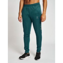 Spodnie dresowe polyesterowe Hummel Core XK. Zielone spodnie dresowe damskie Hummel, m, bez wzorów, z dresówki, na fitness i siłownię. Za 203.50 zł.