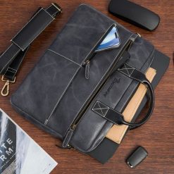 Torba męska skórzana na laptopa ramię komputer duża nubuk czarna Beltimore N04. Czarne torby na laptopa damskie bez wzorów, z nubiku. Za 299.99 zł.