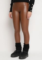 Brązowe Ocieplane Legginsy z Wysokim Stanem Koradi. Brązowe legginsy damskie Born2be, z aplikacjami, z jeansu. Za 34.99 zł.