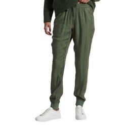 Spodnie turystyczne damskie Superdry Studios Supro Woven Jogger. Niebieskie spodnie sportowe damskie Superdry, bez wzorów, z wiskozy, sportowe, trekkingowe. Za 207.00 zł.