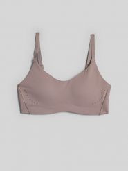 4F Biustonosz do jogi z niskim wsparciem damski - beżowy M. Brązowe bielizna sportowa damska 4F, m, bez wzorów. Za 129.99 zł.