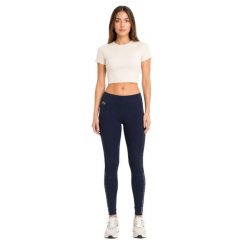 Spodnie damskie Lacoste sportowe treningowe legginsy granatowe. Niebieskie legginsy sportowe damskie Lacoste, uniwersalny, bez wzorów, z elastanu, na fitness i siłownię. Za 357.00 zł.