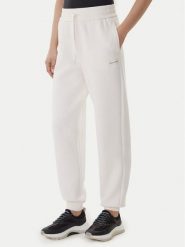 Armani Exchange Spodnie dresowe XW001287 AF16134 U1003 Écru Regular Fit. Spodnie dresowe damskie Armani Exchange, bez wzorów, z dresówki. Za 509.99 zł.