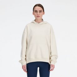 Bluza damska New Balance WT41537LIN – beżowa. Brązowe bluzy damskie New Balance, l, bez wzorów, z bawełny, klasyczne, bez ramiączek, bez kaptura. Za 399.99 zł.