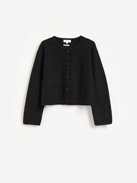 Wełniany kardigan - czarny. Czarne kardigany damskie Reserved, l, bez wzorów, z wełny, bez kołnierzyka. Za 299.99 zł.