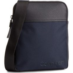 Saszetka CALVIN KLEIN - Vault Flat Crossover K50K504282 068. Niebieskie saszetki i nerki męskie Calvin Klein, bez wzorów, z materiału. W wyprzedaży za 259.00 zł.