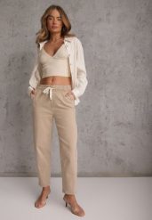 Beżowe Jeansy Mom Fit High Waist z Bawełny ze Ściągaczem w Pasie Phiales. Brązowe jeansy damskie Renee, bez wzorów, z bawełny, z podwyższonym stanem, długie. Za 129.99 zł.