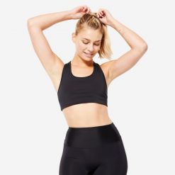 Stanik sportowy Decathlon. Czarne koszulki sportowe damskie Decathlon, s, bez wzorów, z elastanu, bez ramiączek, na jogę i pilates. W wyprzedaży za 29.99 zł.