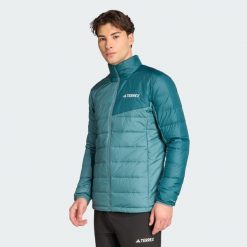 Kurtka Terrex Multi Light Down CLIMAWARM z lekkim ociepleniem z puchu. Niebieskie kurtki męskie Adidas, bez wzorów, z puchu, sportowe, bez kaptura. Za 599.00 zł.