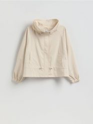 Krótka parka ze ściągaczami - kremowy. Białe parki damskie Reserved, l, bez wzorów, z tkaniny, bez kaptura. Za 159.99 zł.