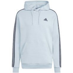 Bluza męska adidas Essentials Fleece 3-Stripes Hoodie. Niebieskie bluzy sportowe męskie Adidas, m, bez wzorów, z materiału, z kapturem, do biegania. Za 222.00 zł.