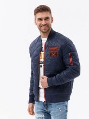 Kurtka męska ocieplana bomberka - granatowa V2. Niebieskie kurtki męskie Ombre Clothing, l, z aplikacjami, z nylonu, militarne, bez kaptura. W wyprzedaży za 69.99 zł.