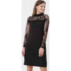 Czarna Sukienka Pretty Unique. Czarne sukienki damskie Born2be, na co dzień, l, bez wzorów, z koronki, bez kołnierzyka, bez ramiączek, mini, dopasowane. Za 79.99 zł.