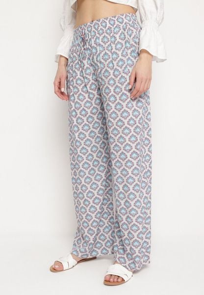 Niebiesko-Beżowe Spodnie z Wiskozy w Mozaikowy Wzór z Gumką w Pasie Rivan. Niebieskie spodnie materiałowe damskie Born2be, bez wzorów, z jeansu, eleganckie, z podwyższonym stanem. Za 39.99 zł.