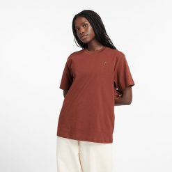 Koszulka damska New Balance WT41501ROK – brązowa. Brązowe bluzki damskie New Balance, xl, bez wzorów, z materiału, eleganckie, bez kołnierzyka, bez ramiączek. Za 69.99 zł.