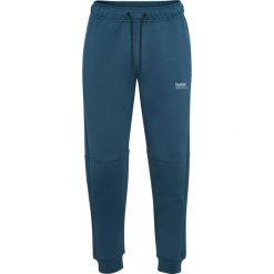 Spodnie dresowe z polaru Hummel Tech Regular. Niebieskie spodnie dresowe damskie Hummel, bez wzorów, z dresówki, sportowe. Za 304.00 zł.