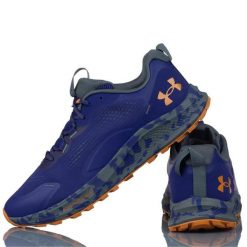Buty Sportowe Męskie Under Armour Charged Bandit TR 2. Fioletowe buty sportowe męskie Under Armour, bez wzorów, bez zapięcia, do biegania. Za 360.80 zł.