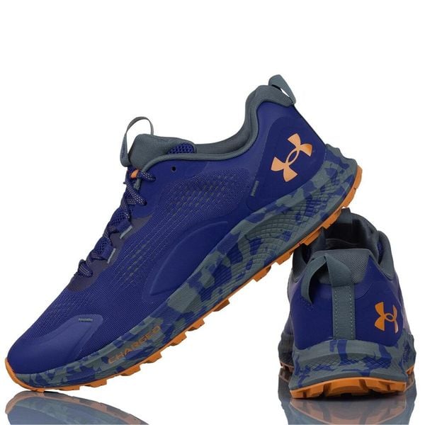 Buty Sportowe Męskie Under Armour Charged Bandit TR 2. Fioletowe buty sportowe męskie Under Armour, bez wzorów, bez zapięcia, do biegania. Za 360.80 zł.