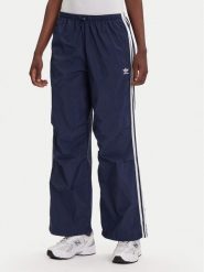 Adidas Spodnie dresowe 3-Stripes JD3127 Granatowy Loose Fit. Niebieskie spodnie dresowe damskie Adidas, bez wzorów, z dresówki. Za 209.99 zł.