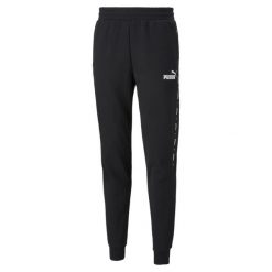 Męskie spodnie dresowe Essentials+ Tape PUMA Black. Czarne spodnie sportowe męskie Puma, m, bez wzorów, z dresówki, na fitness i siłownię. Za 247.00 zł.