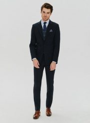 PAKO LORENTE – Gładkie granatowe spodnie garniturowe. Niebieskie eleganckie spodnie męskie Pako Lorente, bez wzorów, z elastanu. Za 699.99 zł.