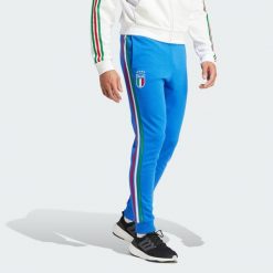Spodnie dresowe Italy DNA. Niebieskie spodnie sportowe męskie Adidas, xl, bez wzorów, z dresówki, do piłki nożnej. Za 262.95 zł.