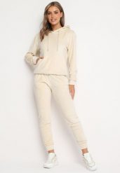 Jasnobeżowy Welurowy Komplet Dresowy Bluza z Kapturem Spodnie z Gumką w Talii Ilseria. Brązowe bluzy damskie Born2be, l, bez wzorów, z dresówki, bez ramiączek, z kapturem. Za 44.99 zł.