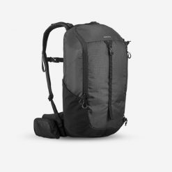 Plecak turystyczny Quechua MH100 20 l. Czarne plecaki damskie QUECHUA, bez wzorów, z materiału, sportowe. Za 129.99 zł.