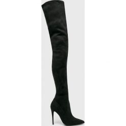 Steve Madden - Kozaki Dominique. Czarne kozaki damskie Steve Madden, bez wzorów, z gumy, bez obcasa, na obcasie, bez zapięcia. Za 499.90 zł.