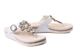 RIEKER V1461-90 silver/platinum, klapki japonki damskie. Brązowe klapki damskie Rieker, na lato, bez wzorów, bez obcasa, bez zapięcia. Za 287.92 zł.