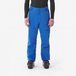 Spodnie narciarskie i snowboardowe męskie Quechua 500. Niebieskie spodnie sportowe męskie WED'ZE, m, bez wzorów, z materiału, narciarskie. Za 279.99 zł.