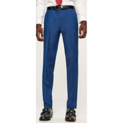 Spodnie garniturowe slim fit - Niebieski. Niebieskie eleganckie spodnie męskie Reserved, m, bez wzorów. Za 149.99 zł.