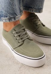 Zielone Klasyczne Tenisówki z Ozdobnym Paskiem przy Podeszwie Ranora. Zielone obuwie sportowe damskie Born2be, bez wzorów, z dresówki, bez zapięcia, tenisowe. Za 49.99 zł.