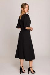Elegancka sukienka koktajlowa z bufiastymi rękawami czarna. Czarne sukienki damskie Stylove, na imprezę, l, bez wzorów, z elastanu, eleganckie, bez kołnierzyka, bez ramiączek, midi, dopasowane. Za 509.00 zł.