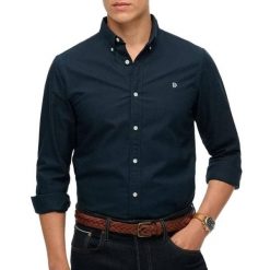 Koszula z długim rękawem Superdry Preppy Oxford. Niebieskie koszule męskie Superdry, xl, bez wzorów, z bawełny, klasyczne, bez kołnierzyka, bez ramiączek. Za 243.00 zł.