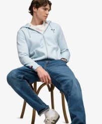 Superdry Bluza z kapturem Essential Logo z połowicznym szczotkowaniem i zamkiem. Niebieskie bluzy damskie Superdry, xl, bez wzorów, bez ramiączek, z kapturem. Za 345.10 zł.