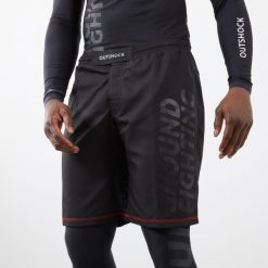 Spodenki do MMA / Grapplingu Outshock Fightshort 500. Czarne stroje kąpielowe damskie OUTSHOCK, bez wzorów, z elastanu, sportowe. Za 129.99 zł.