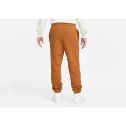Spodnie męskie nike air jordan essentials statement fleece pants desert bronze. Brązowe spodnie sportowe męskie Nike, m, bez wzorów, z dresówki, do koszykówki. Za 389.00 zł.