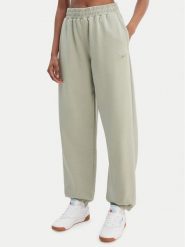 Reebok Spodnie dresowe Reebok x Ewa Chodakowska Ada RK25621CCW Zielony Relaxed Fit. Zielone spodnie dresowe damskie Reebok, bez wzorów, z bawełny. Za 249.99 zł.