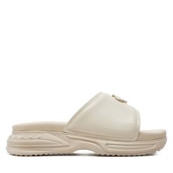 Klapki Calvin Klein Jeans. Klapki damskie Calvin Klein Jeans, bez wzorów, z jeansu, bez obcasa, bez zapięcia. Za 339.99 zł.