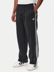 Adidas Spodnie dresowe adicolor Spacer KS7433 Czarny Baggy Fit. Czarne spodnie sportowe męskie Adidas, m, bez wzorów, z bawełny, trekkingowe. Za 349.99 zł.