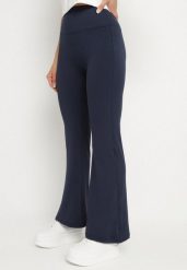 Granatowe Spodnie Legginsy Typu Dzwony z Wysokim Stanem Melonell. Niebieskie legginsy damskie Born2be, bez wzorów, z jeansu. Za 49.99 zł.