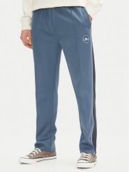 Converse Spodnie dresowe Retro Track 10027328-A01 Niebieski Regular Fit. Niebieskie komplety dresowe męskie Converse, l, bez wzorów, z dresówki. Za 199.99 zł.